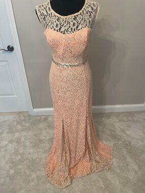Elegant Peach Lace Evening Gown with Illusion Neckline